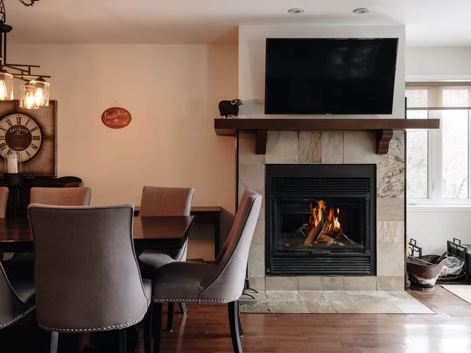 Get cozy in front of the wood burning fireplace (wood not included)