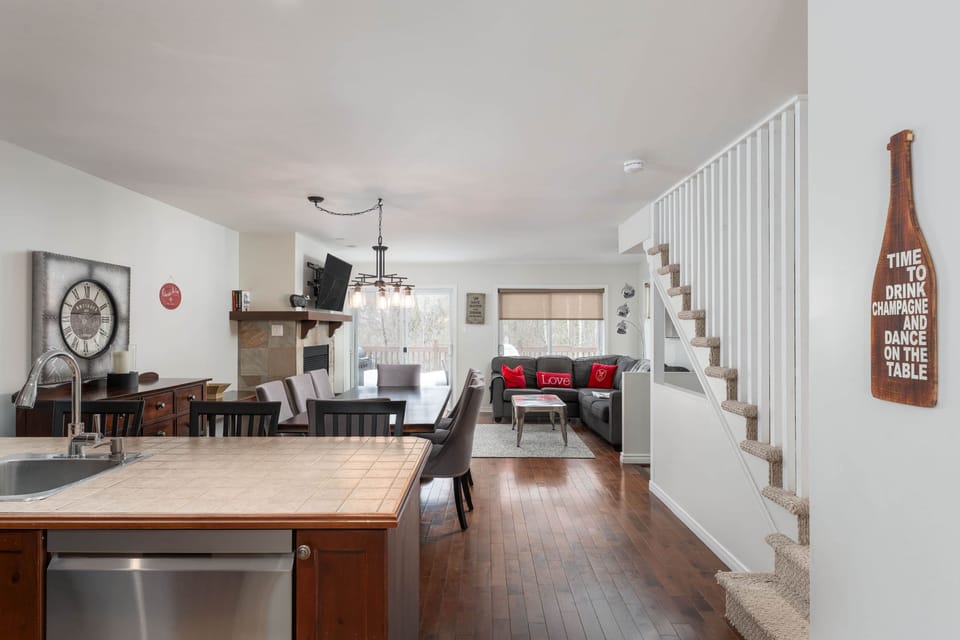 The whole family can enjoy the open concept main floor with wood fireplace