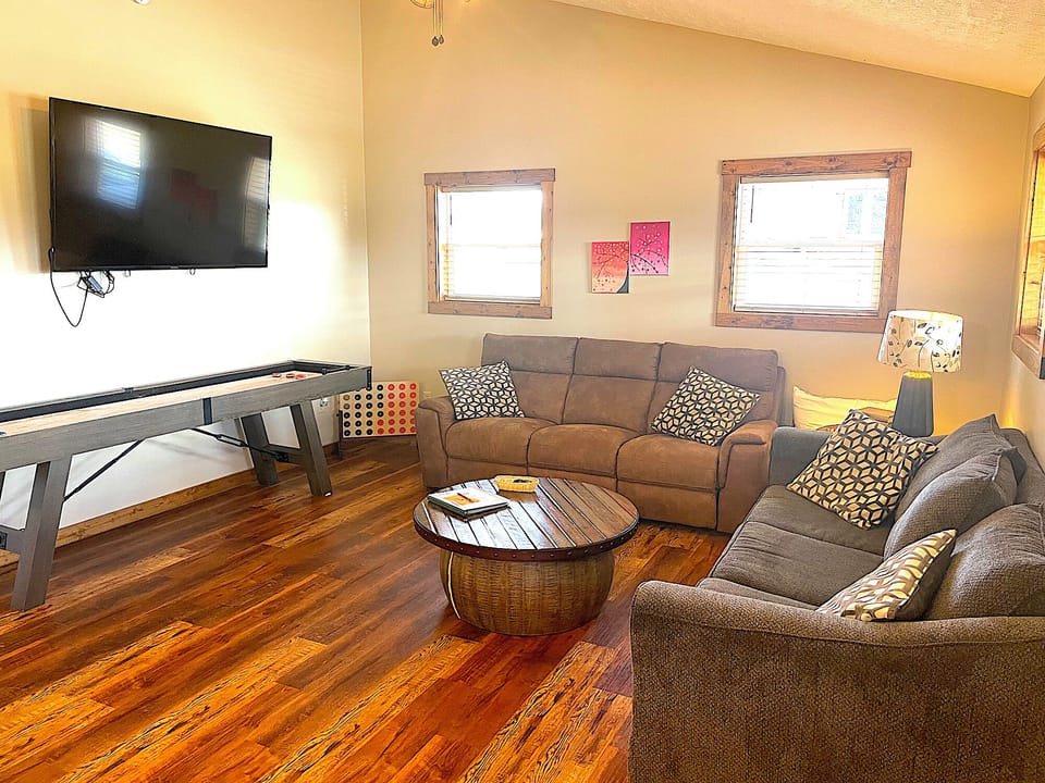 Living Area w/ TV and Shuffle Board Table