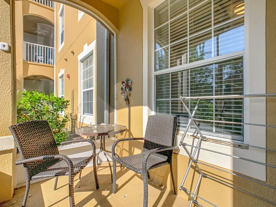 Charming outdoor patio with seating—perfect for morning coffee or evening relaxation.