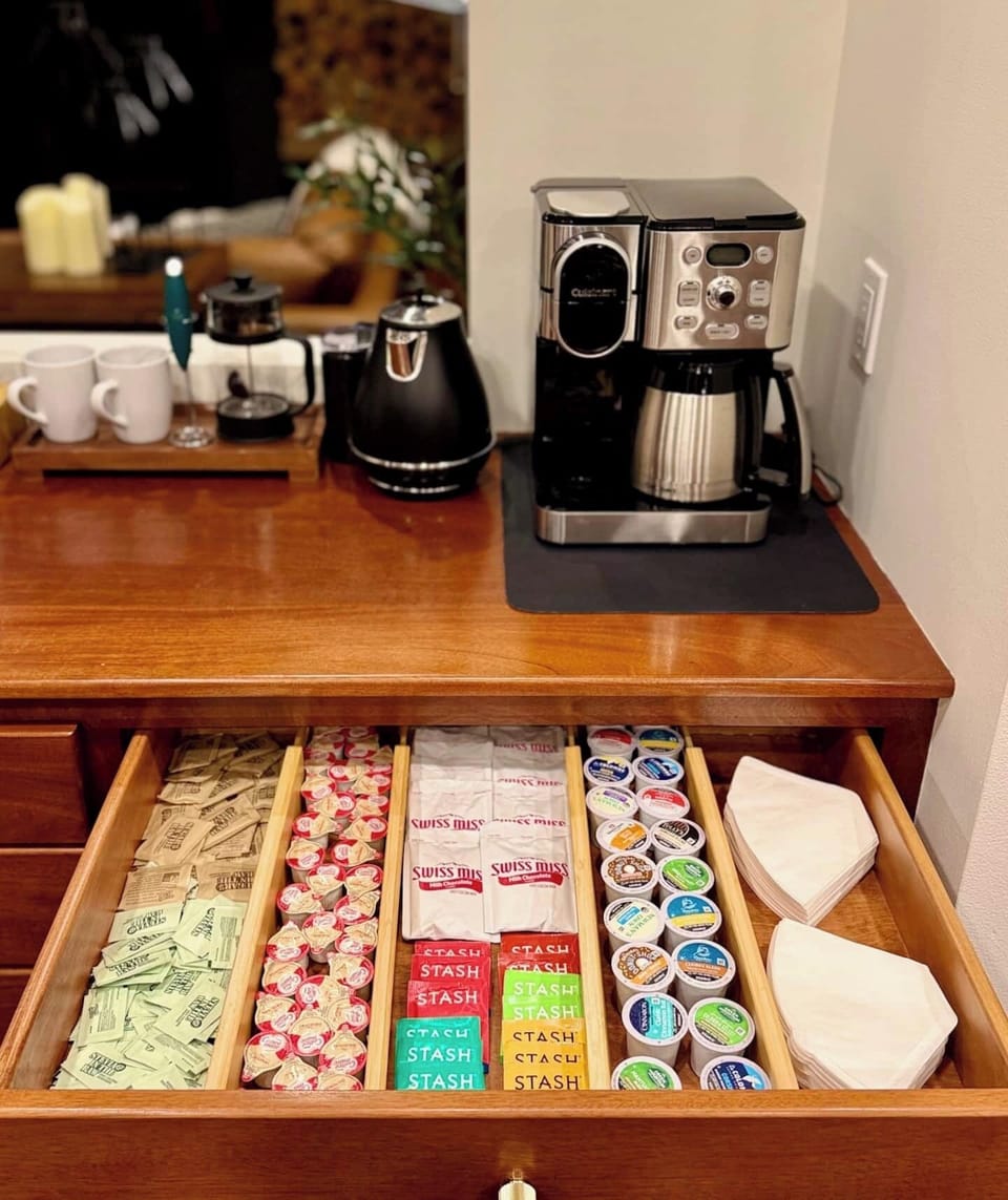 Fully stocked coffee drawer with all the extras