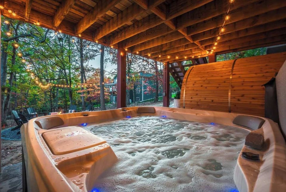 Covered hot tub + cedar sauna with Bluetooth speakers—perfect for year-round relaxation, rain or shine