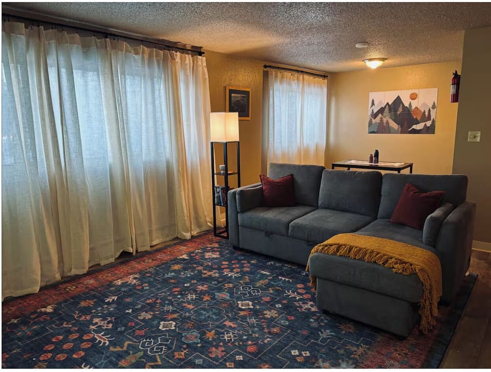 Couch with pull out bed which allows us to sleep 5 guests comfortably. 