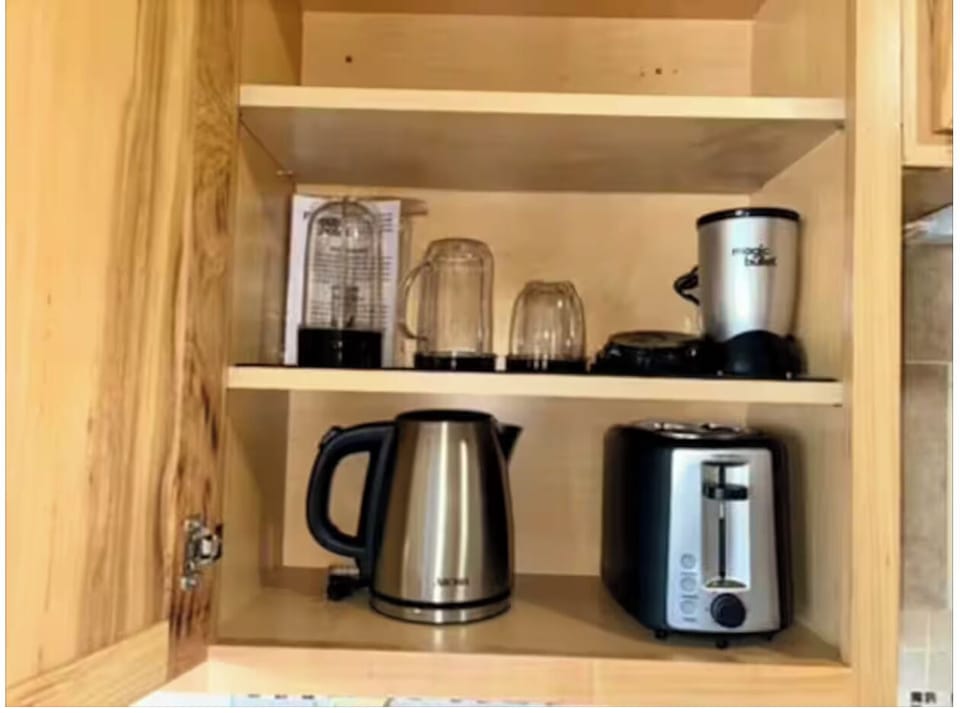 Additional appliances, not visible; 5 cup coffee maker. 