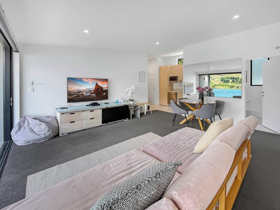 Relax in style in this bright, open-plan living space