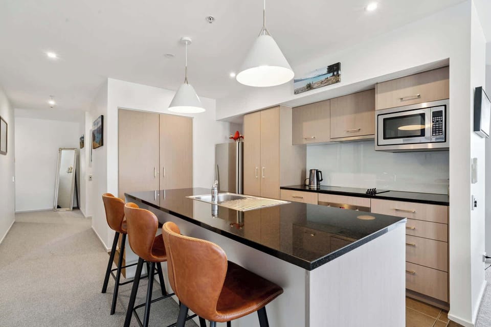 Modern kitchen with breakfast bar seating