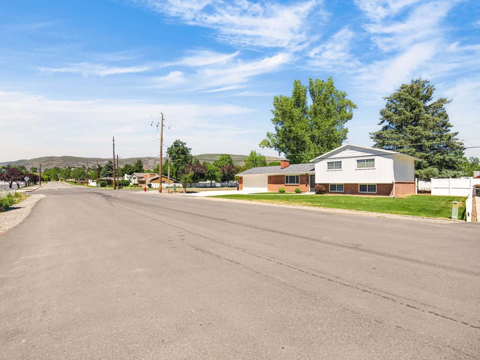 This late 60's home has been tastefully and thoughtfully remodeled inside and out.  New roof, driveway, lawns, exterior finishings and backyard.