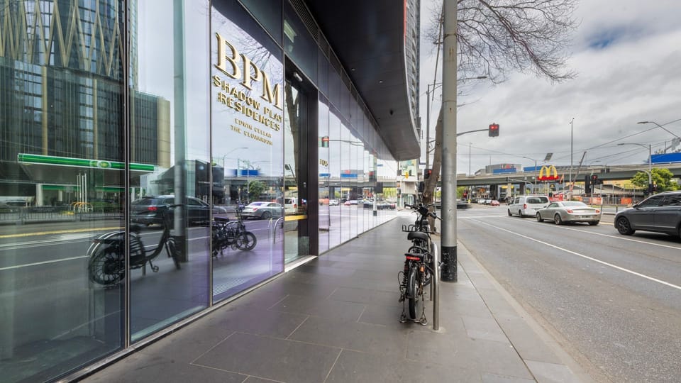 Street-level entrance with easy access to nearby shops and transport