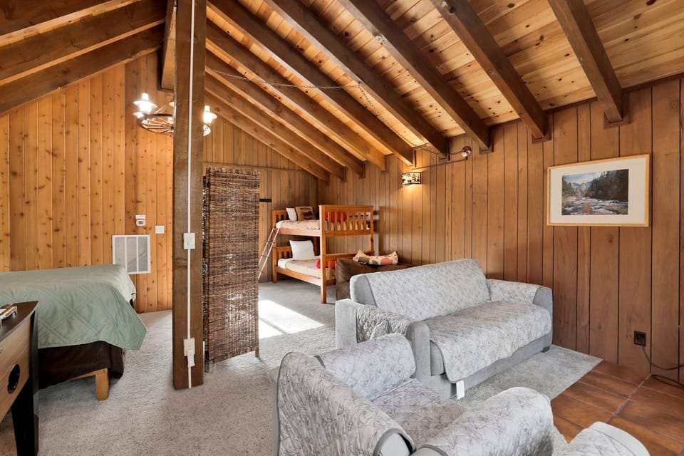 Enjoy this nice bunkroom with TV and Foosball, pool table downstairs