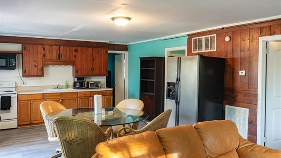 Open living, dining, and kitchen area