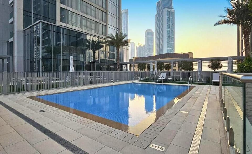 Take a refreshing dip in the pool with panoramic city views, offering a serene escape from the hustle and bustle.