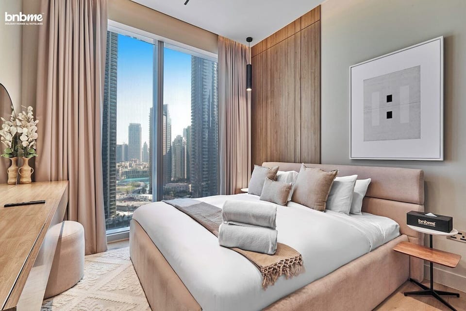 Retreat to the luxurious bedroom featuring a king bed, promising nights of restful slumber amidst elegant surroundings.