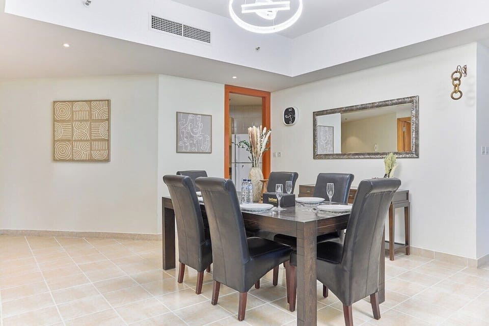 Dine in comfort at this sophisticated dining space, complete with soft lighting and a cozy atmosphere.