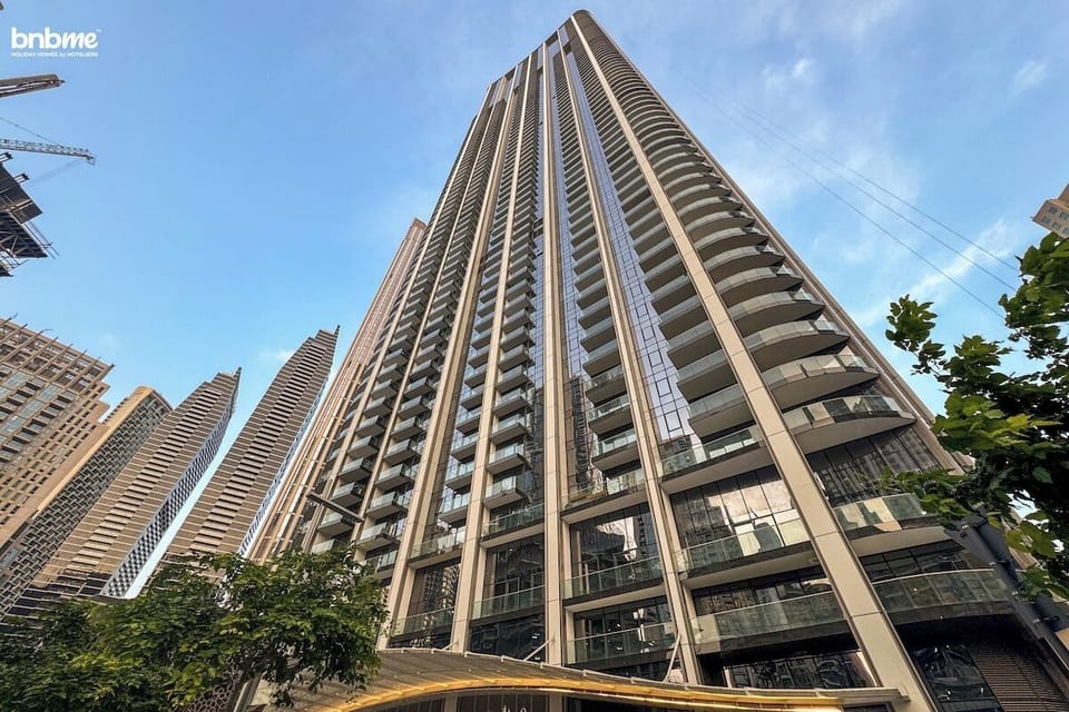 Nestled near the Burj Khalifa, the building’s exterior is a testament to sleek, modern design, offering unparalleled views and a luxury lifestyle.