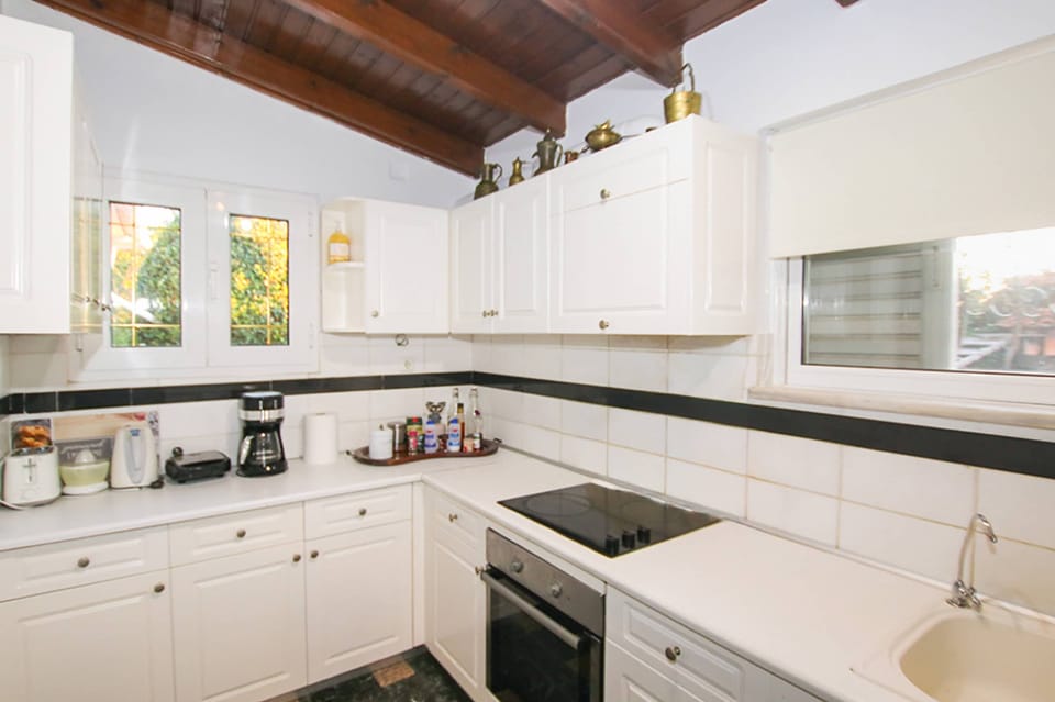 Second kitchen angle showing storage, countertop space, and convenient layout for preparing meals comfortably