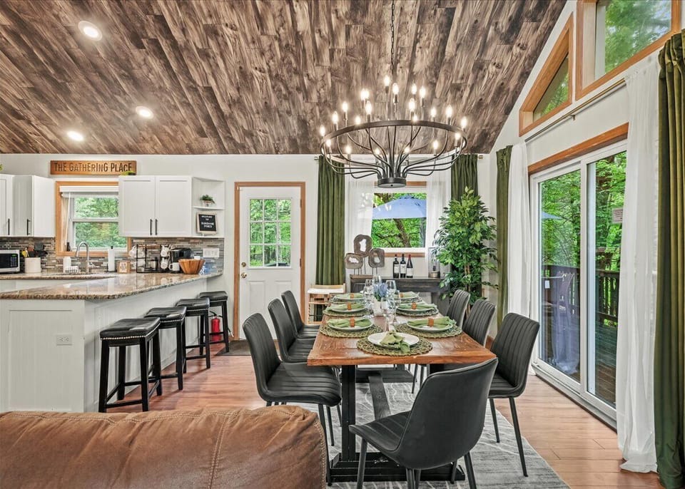 A true gathering place — enjoy home-cooked meals and effortless flow from kitchen to table under a beautiful vaulted ceiling.