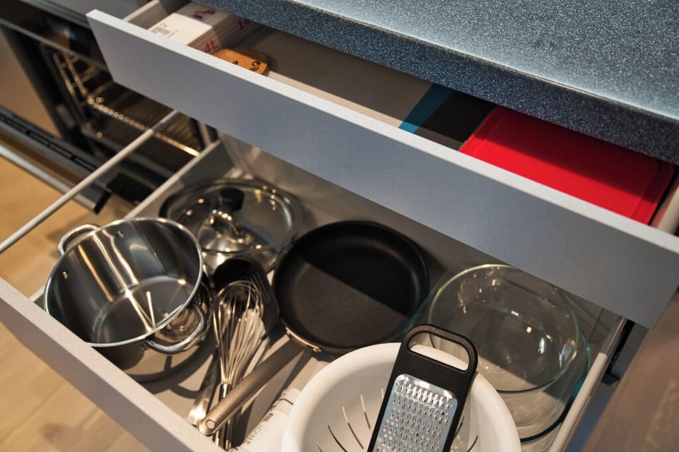 All the necessary kitchen appliances, a grater, cooking pot and others