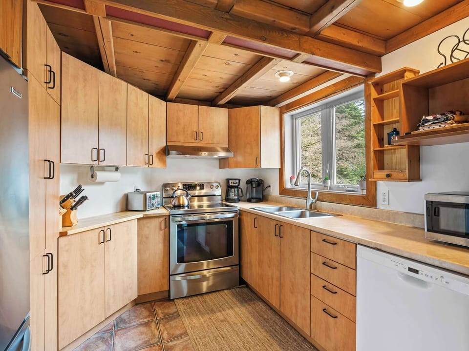 Fully equipped kitchen with rustic charm
