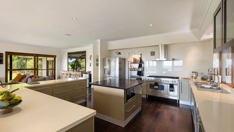 Spacious kitchen designed for cooking and gathering.