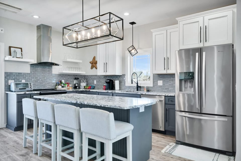 Kitchen | Modern Design with Marble Counters & Stainless Appliances