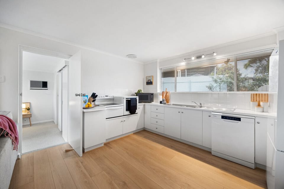 Prepare meals with ease in the bright, open kitchen, where everything you need is within reach for relaxed holiday cooking.
