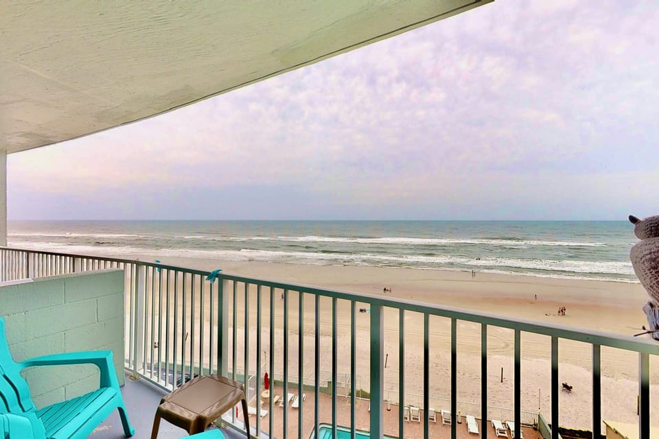 Relax on your private oceanfront balcony with sweeping beach views. Enjoy the soothing waves, fresh sea breeze, and perfect spot for your morning coffee during your beach stay getaway.