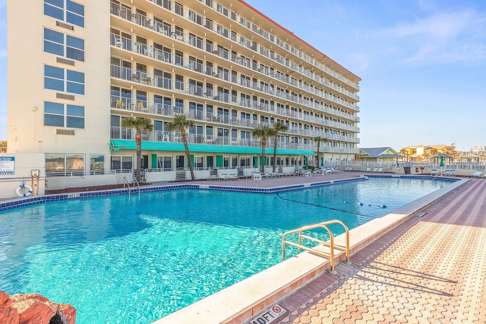 Enjoy resort-style comfort during your beach stay with this spacious oceanfront pool. Lounge in the sun, take a refreshing swim, and relax just steps from the beach and coastal attractions.