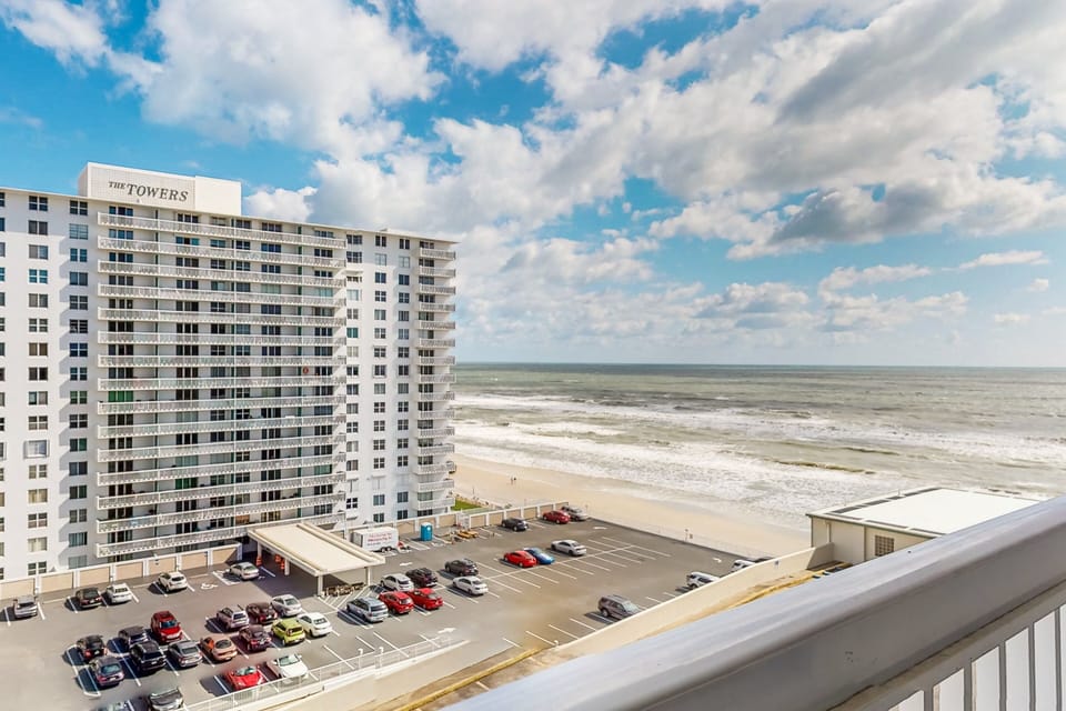 Take in stunning ocean and shoreline views from this private balcony, the perfect backdrop for your beach stay. Enjoy coastal breezes, scenic sunrises, and easy access to the beach just steps from your vacation rental.