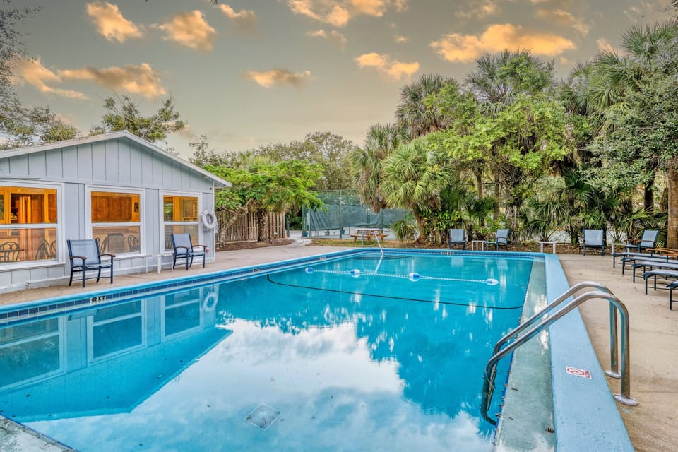 Soft evening light reflects across the pool.