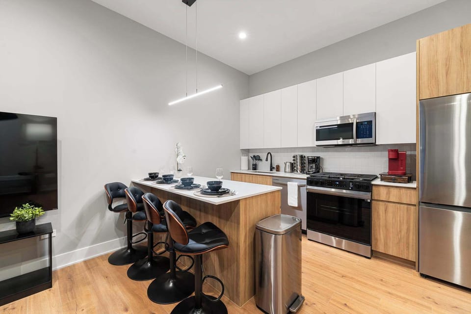 Bright kitchen island set up for quick breakfasts or lingering coffee moments