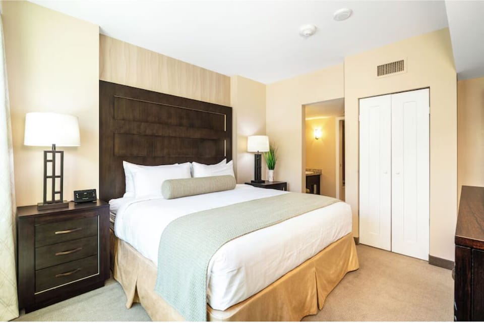 Comfortable king-sized bed with en-suite bathroom.