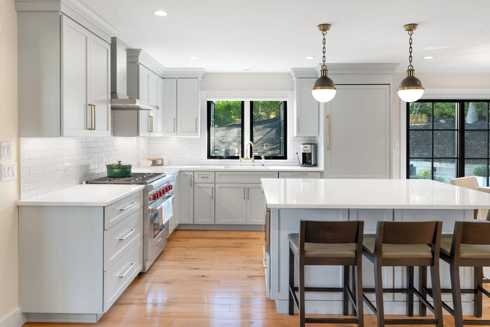 Kitchen with stainless appliances and wine cooler