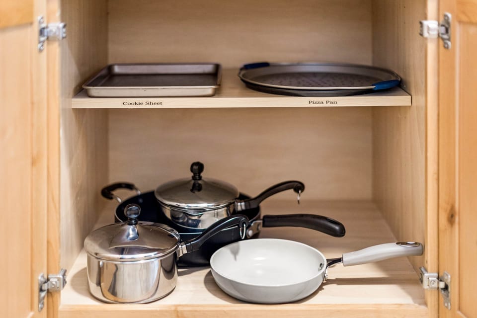 Fully equipped kitchen with all the essential cooking pans