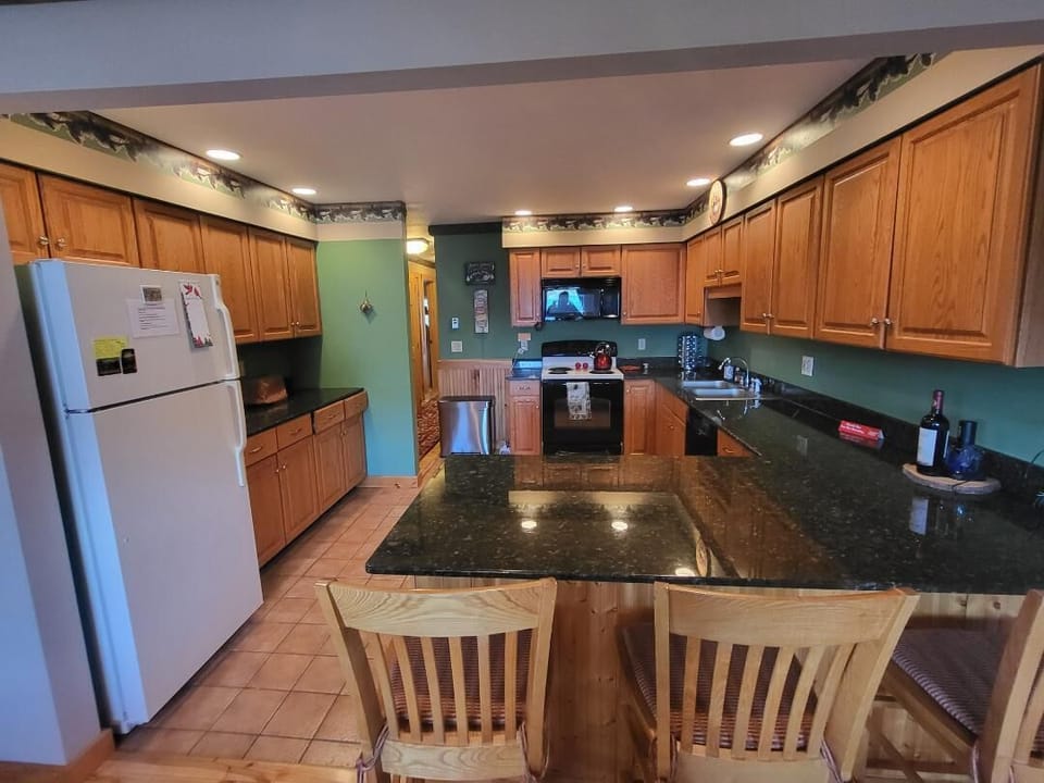 Another view our kitchen, which opens into our dining room, and with views! 