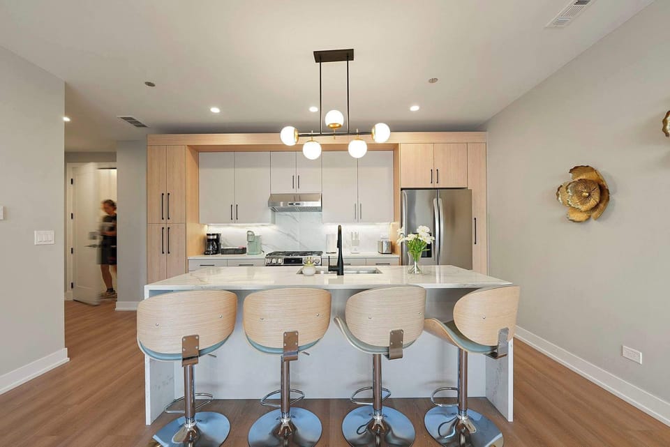 Contemporary kitchen layout that keeps cooking simple and social.