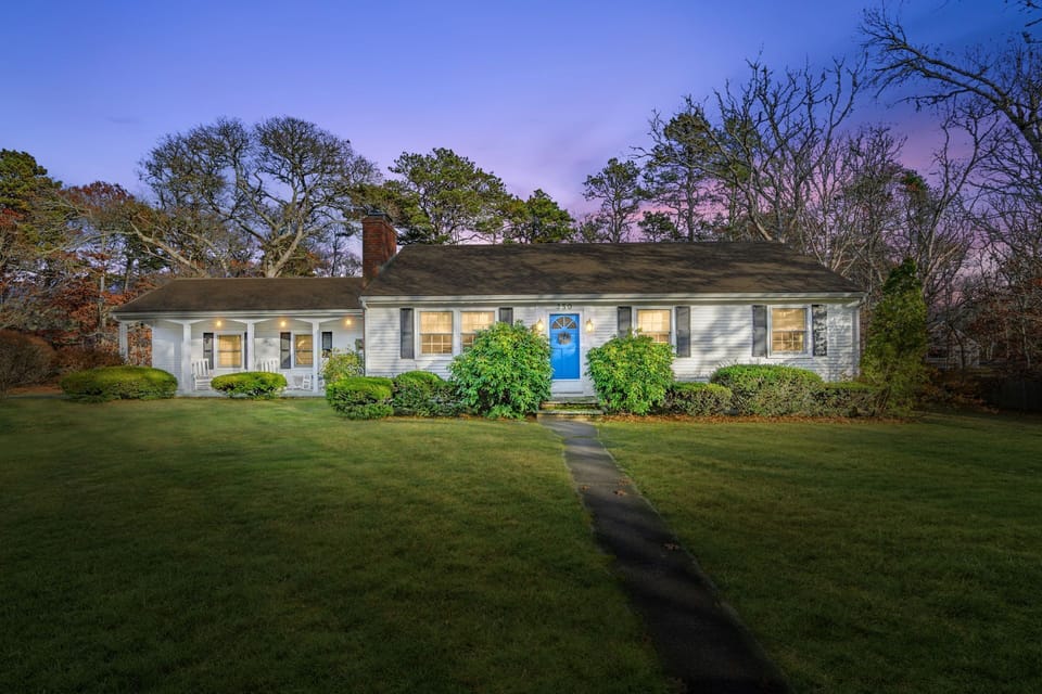 Evening exterior view of the home at dusk