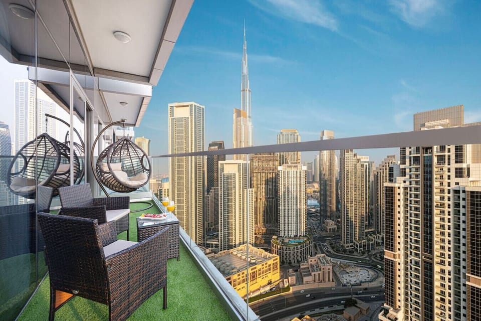 Furnished Balcony with outdoor seating and direct views of the Burj Khalifa and downtown Dubai Skyline