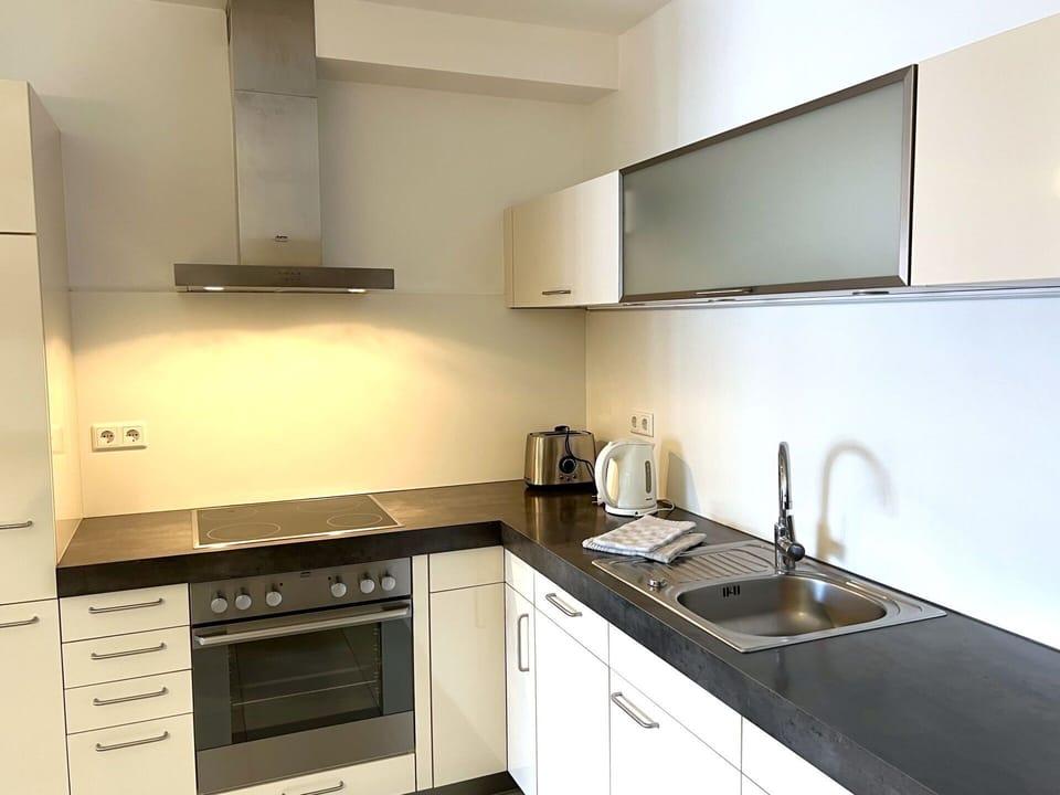 Countertop, Kitchen, Kitchen Appliance, Flooring, Cabinetry, Interior Design, Wood, Major Appliance, Kitchen Sink, Floor