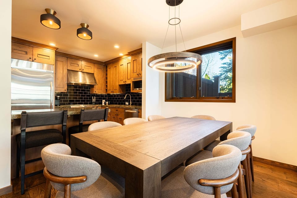 Dining Area
Stylish dining table with seating for 8, perfect for meals or game nights with friends.