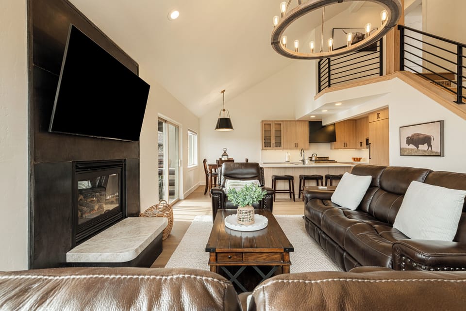 Vaulted ceilings and loft view add space and style.