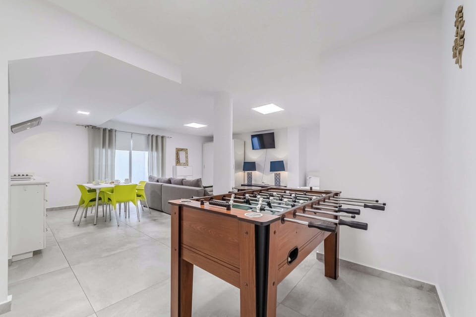 Open-Concept Lounge with Foosball & Kitchen  