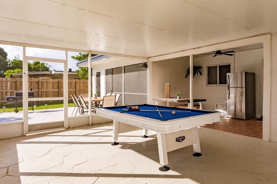  Covered game area with pool table

