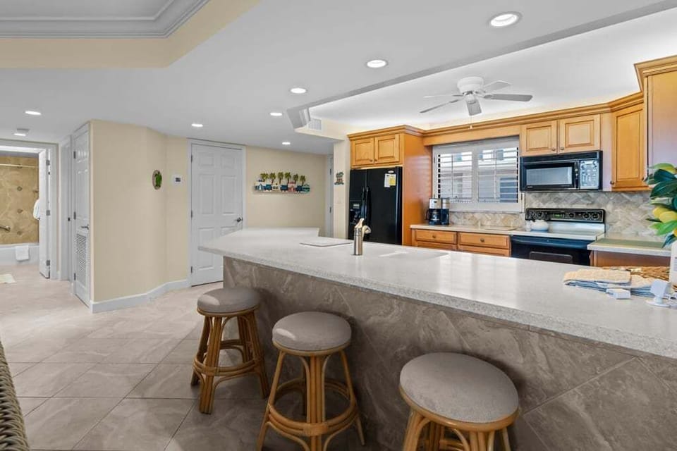 Open concept kitchen with counter seating