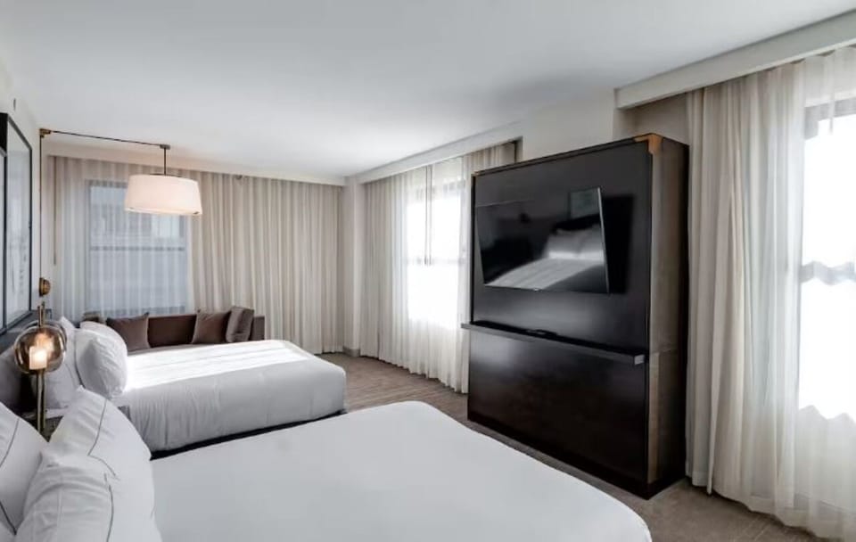 Wake up to soft daylight and enjoy movies from bed.