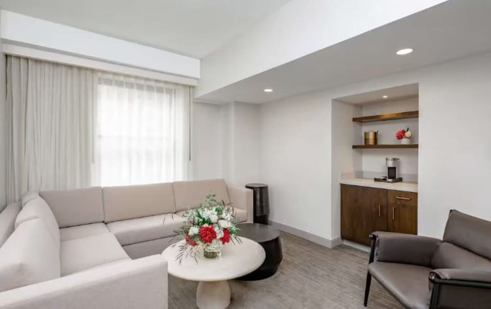 Gather and relax in a spacious lounge with soft sectional seating.
