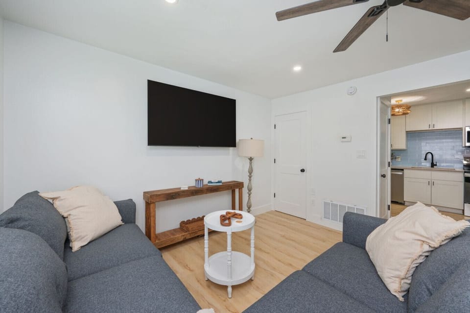 Cozy living room with a TV, perfect for relaxing after a day outdoors