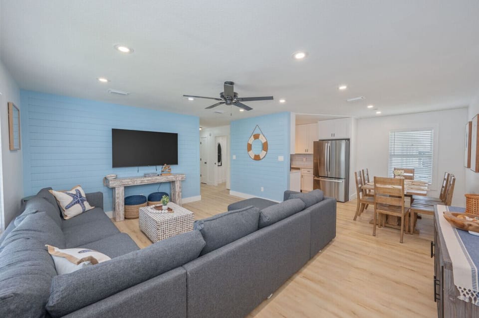 Cozy living room with a TV, perfect for relaxing after a day outdoors