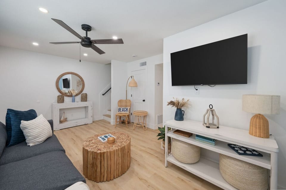 Cozy living room with a TV, perfect for relaxing after a day outdoors
