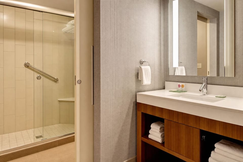Refresh in a bright bathroom with walk-in shower convenience.