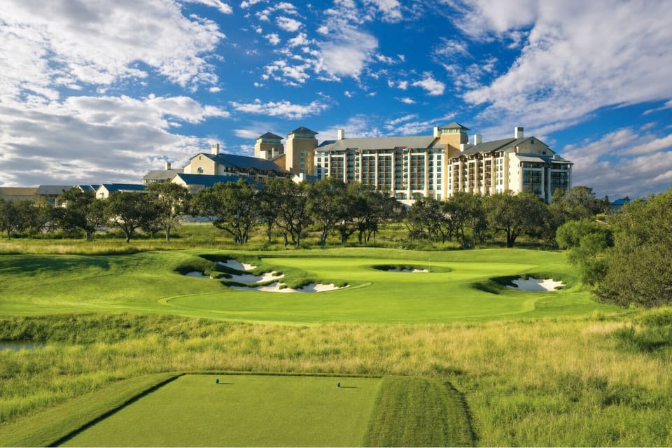 Arrive to sweeping resort views beside a lush golf course.
